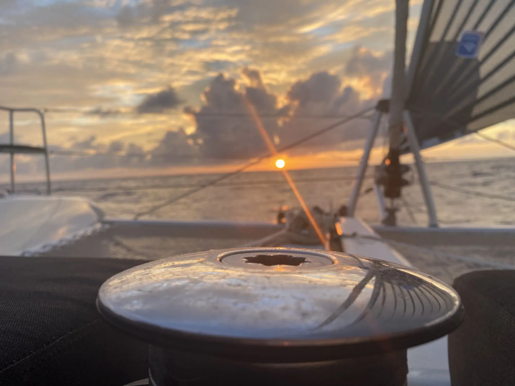 Code Zero sail at sunset aboard Pascal
